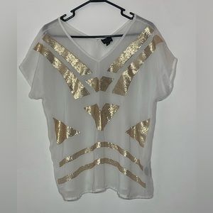 Sheer white top with gold sequin design